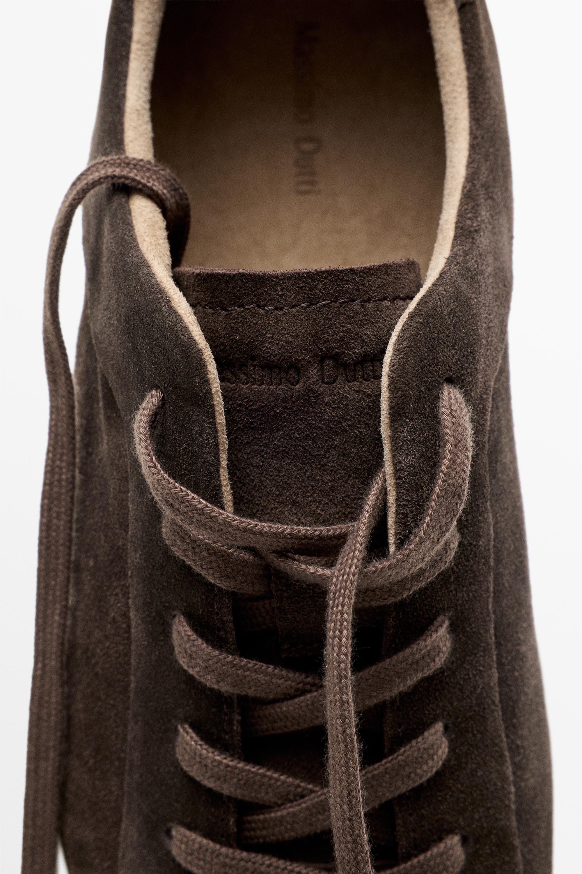 Leather trainers with lug sole